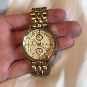 Gold fossil watch